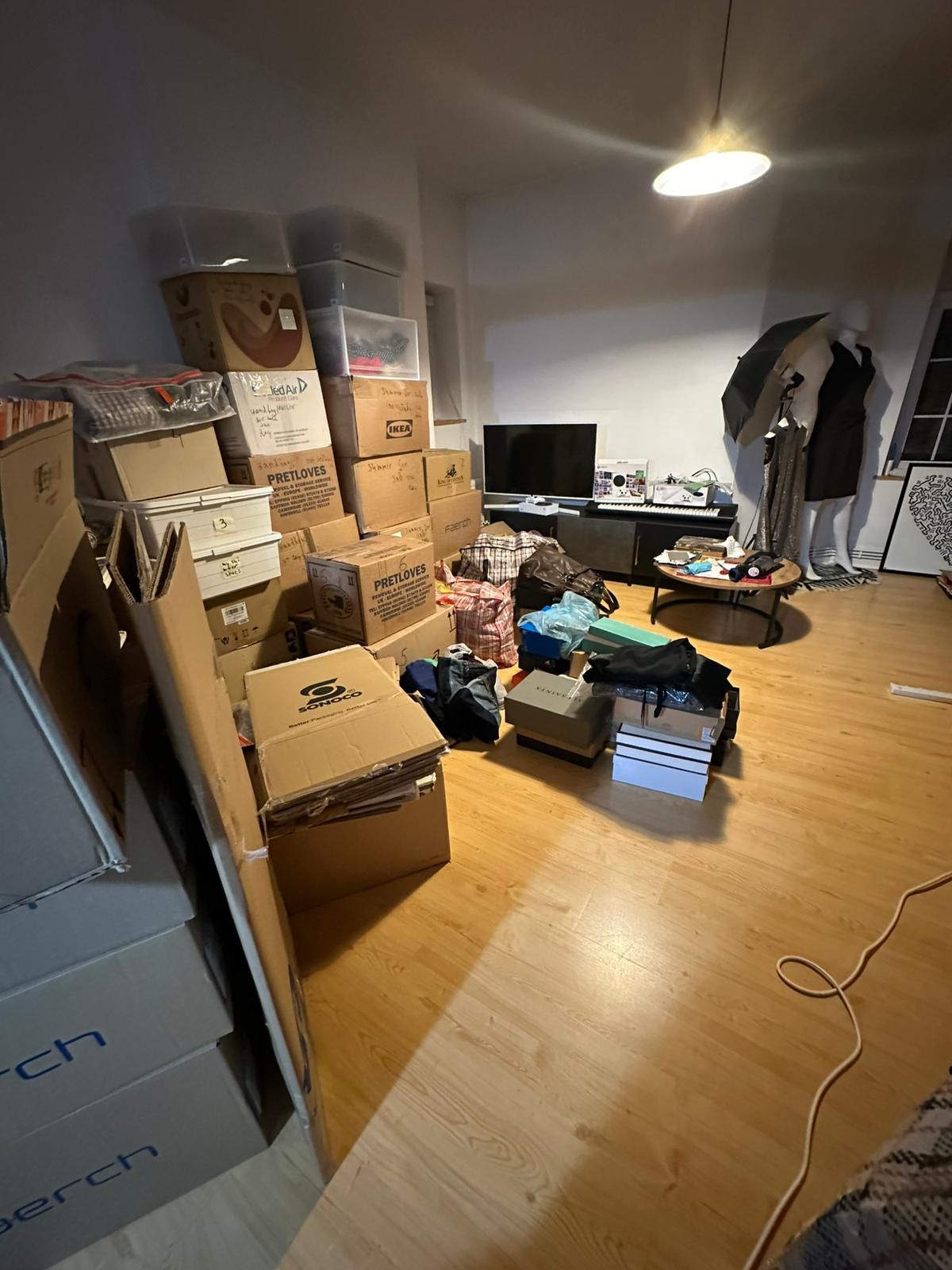 Empty room after clearance with boxes ready